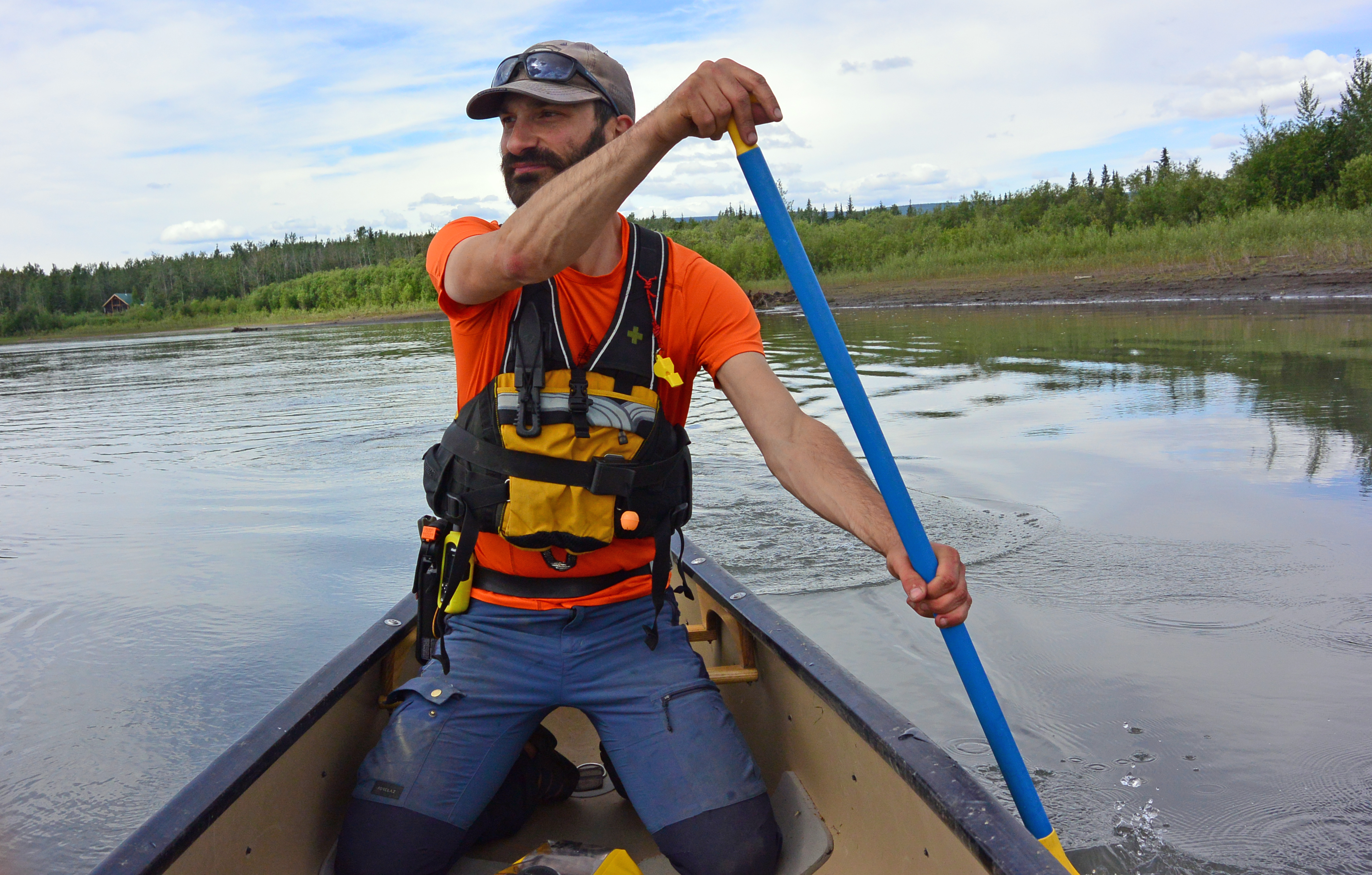 Dr. Alessandro Ielpi pictured, paddling a canoe.