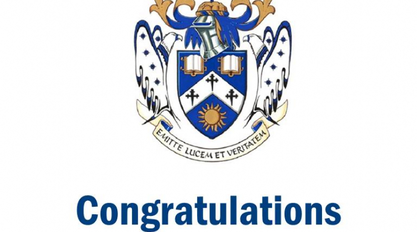 Laurentian University Coat of Arms and Congratulations Graduates text with hashtag #voyageurs 2021